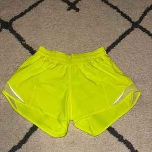 Highlight yellow 4 inch Lululemon Hotty Hot shorts